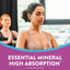 Two adult women meditating. Graphic overlay reads 'ESSENTIAL MINERAL HIGH ABSORPTION* *Compared to Magnesium Oxide'.