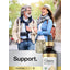 Older couple laughing and holding hands while walking outdoors next to a Doctor's Way Liquid Probiotic bottle.