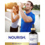 A young man and woman hydrate with water bottles next to Carlyle Electrolyte Drops.