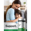 A smiling woman hugs a child with a Corn Silk bottle next to them, symbolizing care and skincare products.