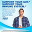 Young adult male smiling while holding his stomach, promoting PB8 Probiotic with visible text.