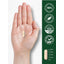 Carlyle Camu Camu Extract 2000 mg capsule rests on an open palm, measuring 7/8 inch.