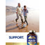 An older man and young boy play soccer on a beach, featuring a bottle of Carlyle Fish Oil nearby.