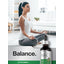 Young woman meditating in yoga pose with a Scullcap Liquid Extract bottle beside her.