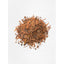 Pile of dried brown bark and wood shavings on a white background