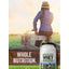 Lifestyle image of adult sitting on a wooden fence with Grass Fed Whey supplement bottle nearby and graphic stating Whole Nutrition.
