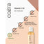 Coera Vitamin E Oil bottle with icons indicating Gluten Free, No Parabens, SLS, Mineral Oil, Fragrance, Artificial Color, Petroleum, NON-GMO, Cruelty Free, and Vegetarian.
