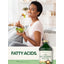 Lifestyle image of adult eating a salad with Carlyle Virgin Macadamia Nut Oil bottle and graphic stating FATTY ACIDS.