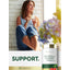 Lifestyle image of woman holding a cup by a window with Carlyle Acerola Cherry 1000MG bottle nearby and graphic stating SUPPORT.