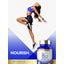 Lifestyle image of adult jumping in athletic wear with Carlyle Sublingual B12 6000MCG bottle and graphic stating NOURISH.