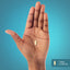 A capsule rests on a hand, measuring 7/8 inch (2.222 cm).