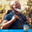 Adult wearing a backpack outdoors with Lindberg Double Strength Fish Oil supplement bottle shown in the foreground