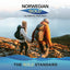 A man and woman hike on a rocky trail with Norwegian Gold Ultimate Fish Oils, emphasizing outdoor adventure and health.