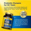 Ultimate Flora bottle with 'Probiotic Pioneers for 30 Years' and '30 YEARS EXPERIENCE' badge, detailing bottle protection.