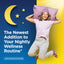 Smiling young adult woman in pajamas and sleep mask jumping with a pillow, against a split night and day background for CleanseMore.