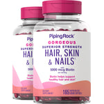 Two bottles of Hair, Skin & Nails with 5000 mcg Biotin, containing 165 rapid release liquid softgels. Dietary supplement.