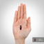 A dark brown softgel measuring 1.062 inches (2.698 cm) long is held in a hand.