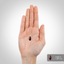 A hand holds a dark red softgel, size 0.625 inches and 1.587 cm, for scale.