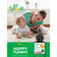 Mother smiles while playing with baby on the floor near a bottle of Lil' Sprouts Baby Probiotic Drops.