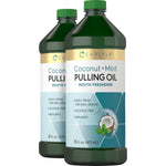 Two bottles of Carlyle Coconut + Mint Pulling Oil, 16 fl. oz. each, used as mouth fresheners.